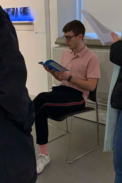 Francesco reading the book live